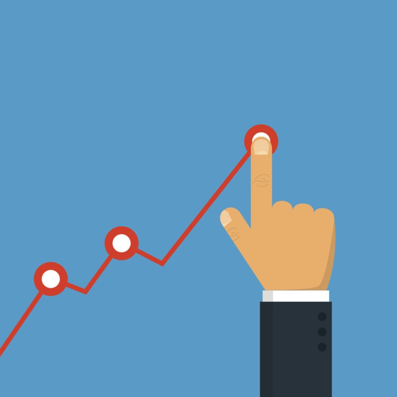 Hand touching up holding chart arrow. Profit concept. Businessman manages financial growth graph. Image of hand touching up holding chart arrow to represent business growth for Tweak's blog post on Award Winning Marketing to Grow Your Company