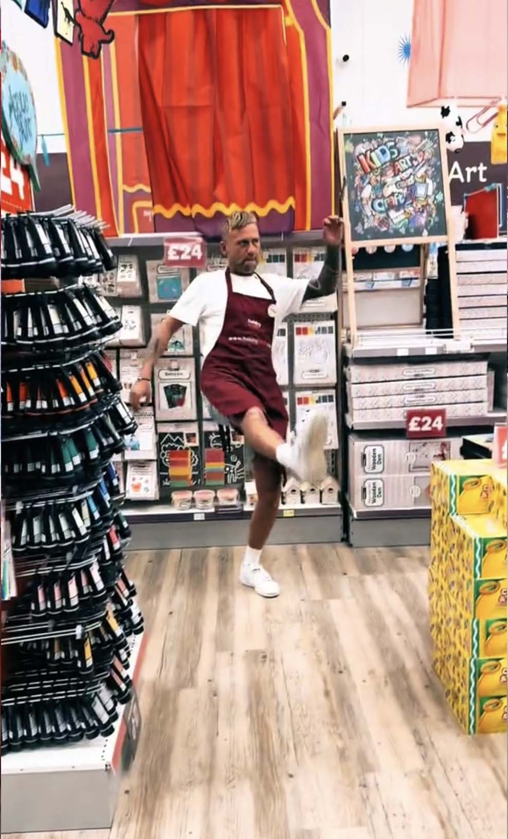 Screenshot Hobbycraft uses employee-generated content (EGC) in this screenshot of a TikTok video with an employee in an aisle of their store.